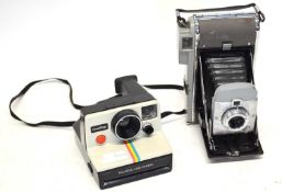 TWO POLAROID LAND CAMERAS INCLUDING MODEL 80 AND ONE STEP