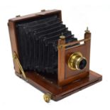 A WOODEN FIELD CAMERA WITH LANCASTER LENS