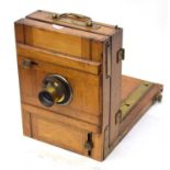 A RARE 1800's WOODEN FIELD PLATE CAMERA WITH BRASS DETAILING AND LENS BY W.I.CHADWICK OF MANCHESTER