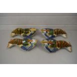 FOUR POTTERY WALL POCKETS FORMED AS LOBSTERS