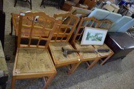 SET OF FOUR MESH BACK OAK FRAMED CHAIRS, INITIALLED TO THE BASE 'MJD 1981'