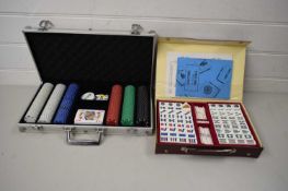 CASE VARIOUS CASINO GAMING CHIPS AND A CASED MODERN MAH JONG SET