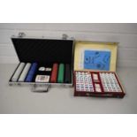 CASE VARIOUS CASINO GAMING CHIPS AND A CASED MODERN MAH JONG SET