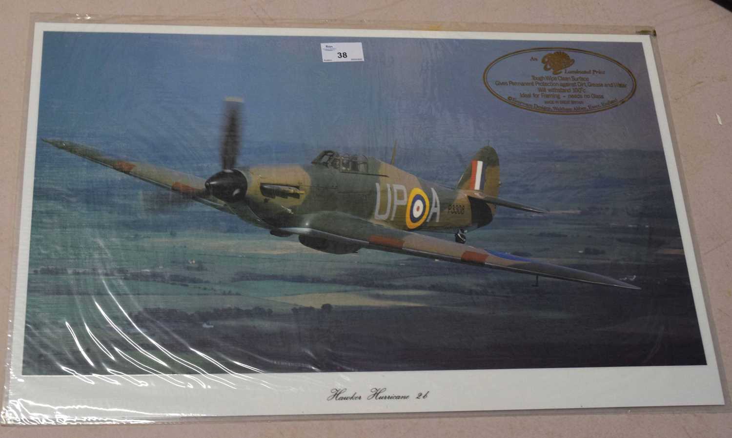Group of laminated prints in original wrapping of a Hawker Hurricane, Spitfire Mk IA, Westland