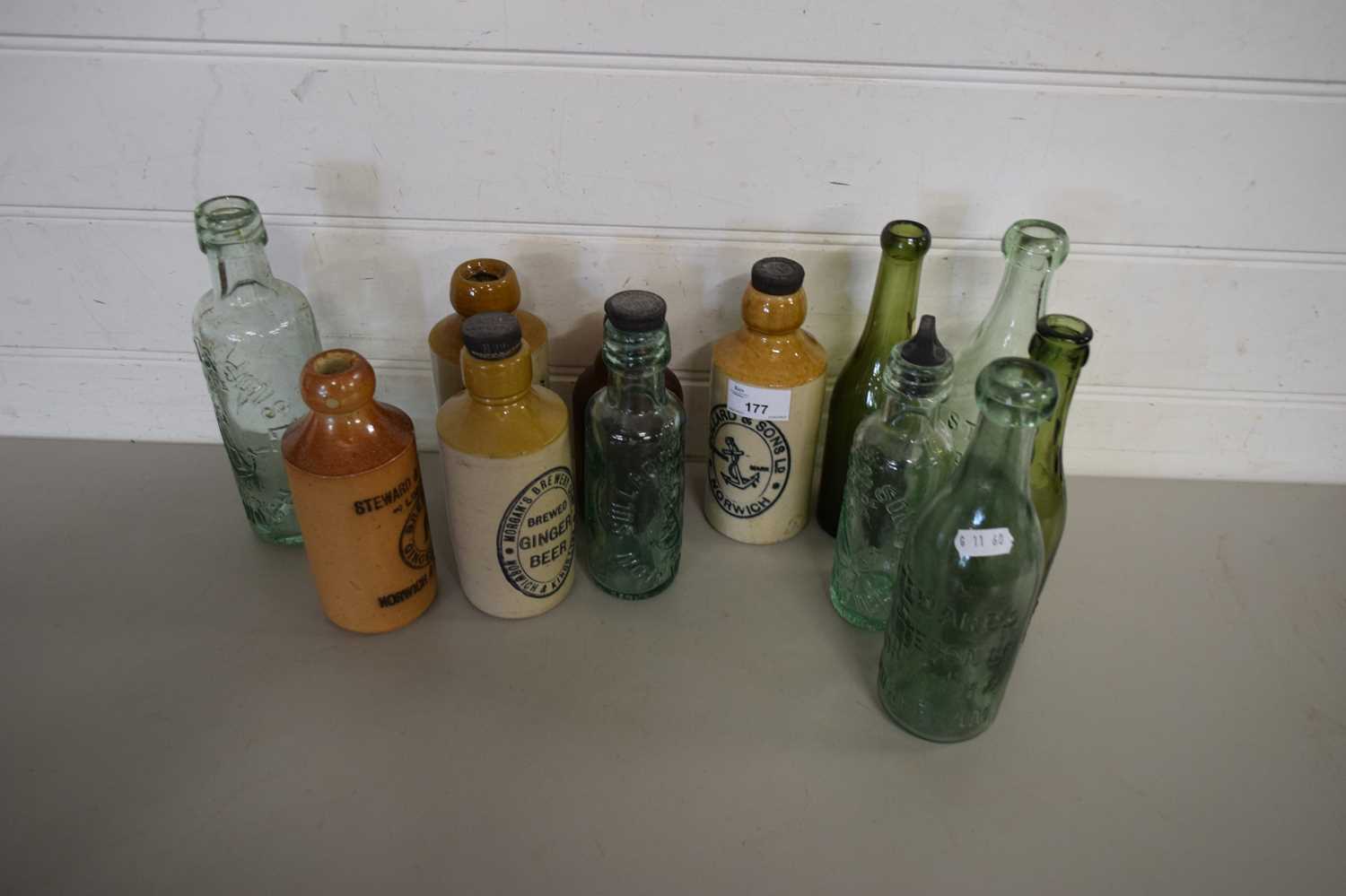 MIXED LOT : STONEWARE GINGER BEER BOTTLES AND GLASS BOTTLES OF LOCAL INTEREST