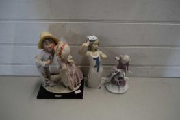 TWO LLADRO STYLE FIGURINES TOGETHER WITH A FURTHER COMPOSITION FIGURE OF TWO CHILDREN KISSING