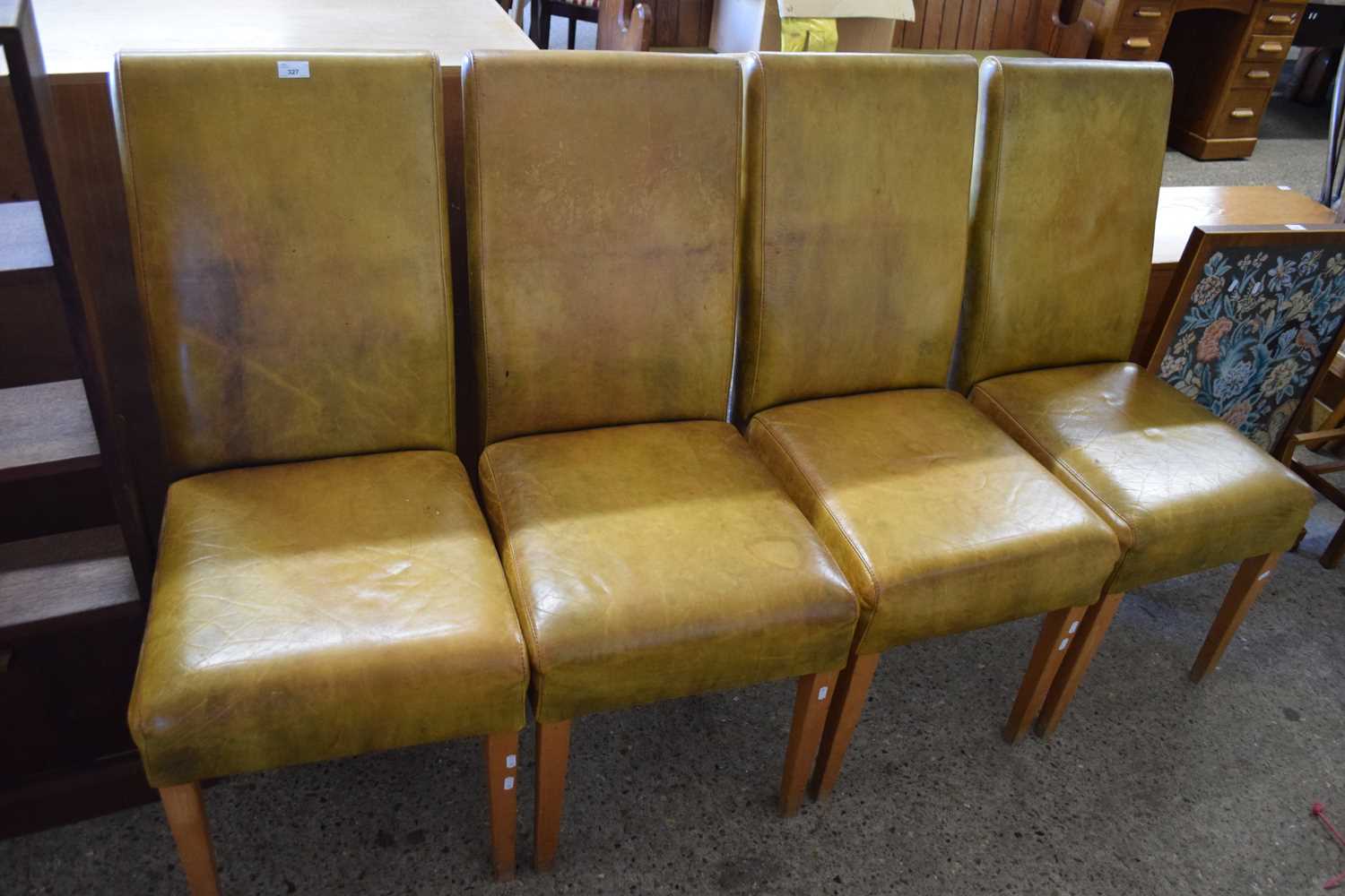 SET OF FOUR LEATHER UPHOLSTERED DINING CHAIRS