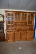 LARGE MODERN PINE KITCHEN DRESSER WITH FOUR GLAZED DOORS TO THE TOP SECTION OVER A BASE WITH TWO