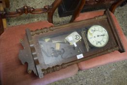 20TH CENTURY HARDWOOD CASED WALL CLOCK WITH GLAZED DOOR