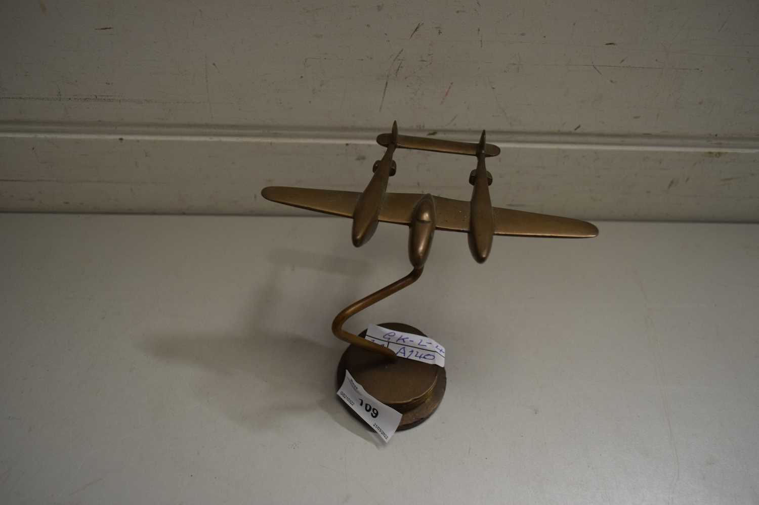 DESK ORNAMENT FORMED AS A PLANE