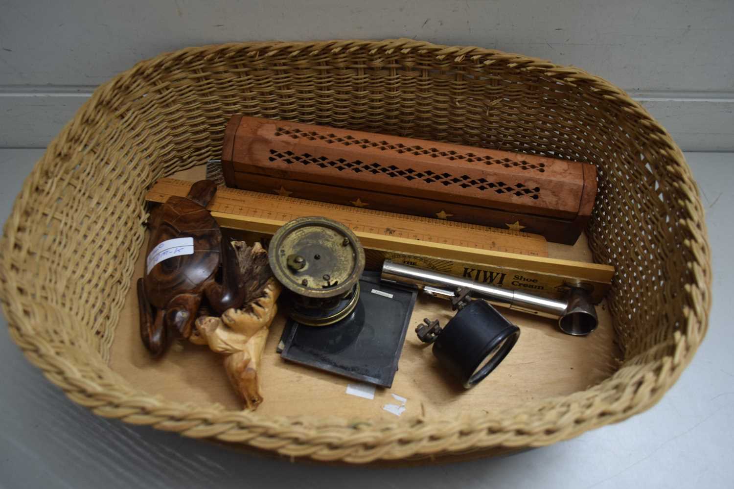BASKET CONTAINING VARIOUS VINTAGE WOODEN RULERS, CLOCK MOVEMENTS ETC