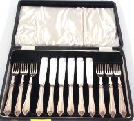 Cased set of six pairs of silver handled fish knives and forks, the handles Sheffield 1937, maker'