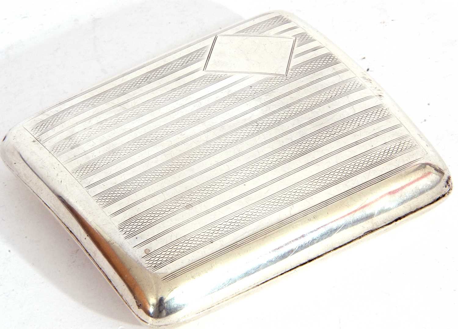 George V silver cigarette case of shaped square form, with engine turned decoration back and - Image 2 of 4