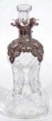 Small late Victorian glass spirit decanter of ‘hour-glass’ form, having applied ornate lattice