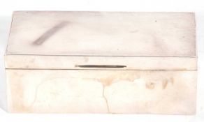 George VI silver table cigarette box of rectangular form, the slightly domed lid with engine