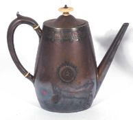 Antique Irish silver plated coffee pot, the borders engraved with floral medallions, one side with a