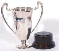 George VI silver twin handled trophy cup of plain polished design, London 1937, maker's mark CE,