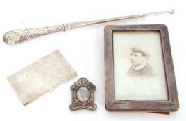 Mixed Lot: large Victorian handled button hook, London 1888, a silver photograph frame, Birmingham