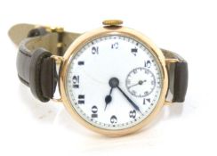 Gents first quarter of 20th century 9ct gold wrist watch, white enamel dial with contrasting black