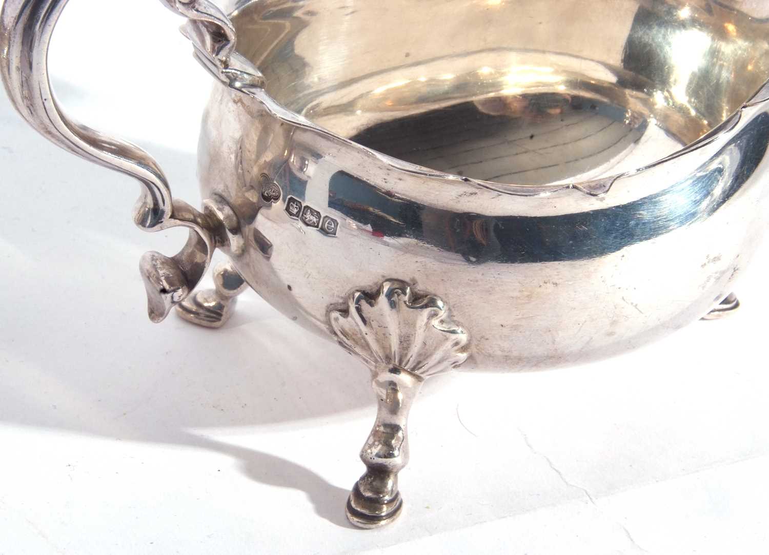 Large pair of George V silver sauce boats, each having card cut rims, capped scroll handles and - Image 4 of 4