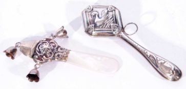 Mixed Lot of babies rattles comprising a silver example with three bells and mother of pearl