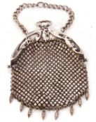 German white metal meshwork evening bag, the top section with a classical figure detail, push button