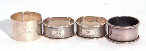 Pair of Elizabeth II D-shaped napkin rings with engine turned decoration, Birmingham 1988/9 and