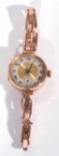 First quarter of 20th century ladies 9ct gold wrist watch on a 9ct gold expanding bracelet, with a