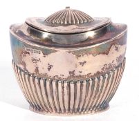 Early 20th century silver sucrier of oval form, half fluted body with hinged lid opening to a gilt