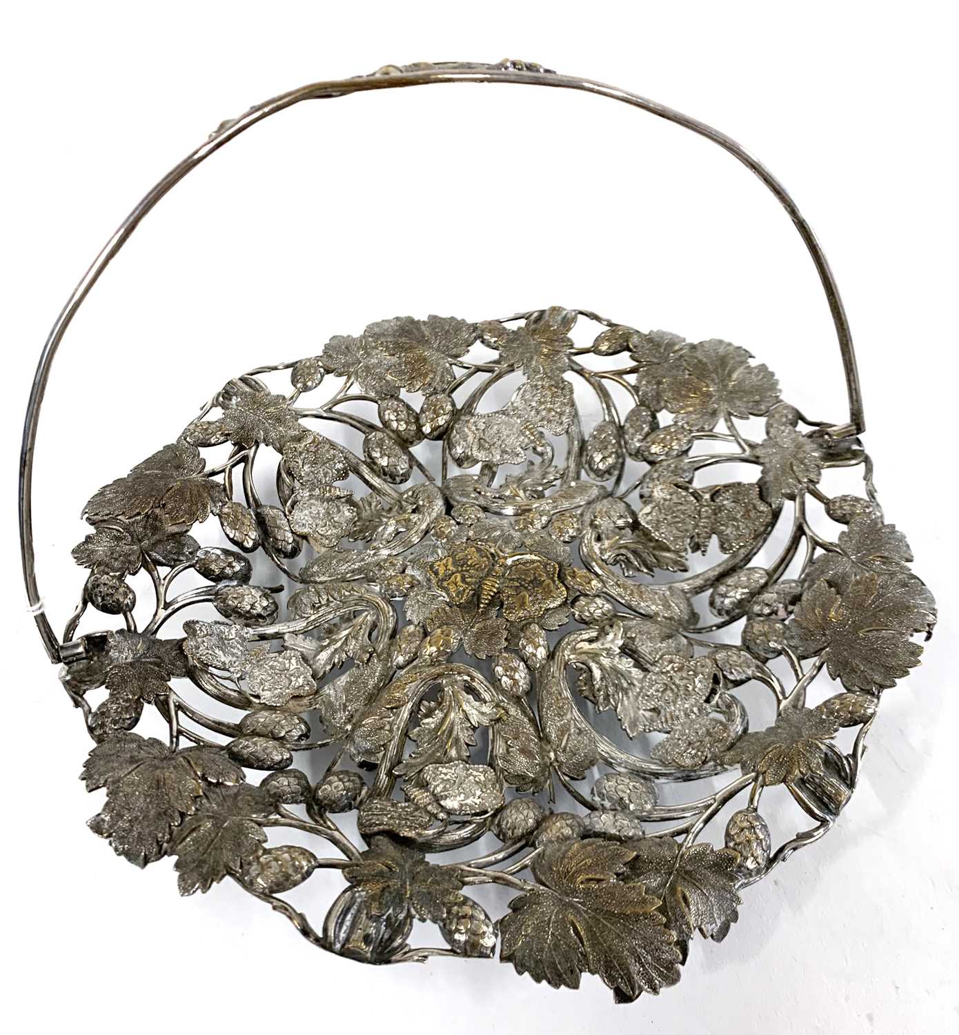 Plated pierced floral and leaf decorated swing handle dish