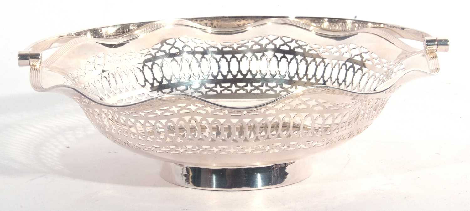 George V silver swing handled dish having a wavy reeded edge, the sides with pierced geometric - Image 2 of 5