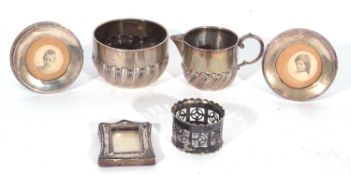Victorian silver cream jug and sugar bowl having half fluted wrythen decoration, London 1889,