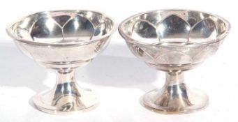 Pair of George V silver pedestal dishes, the bowls decorated with a geometric design, Birmingham