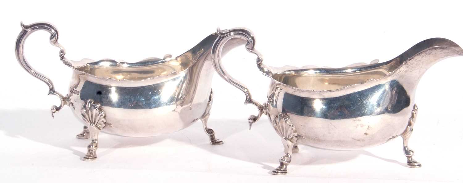 Large pair of George V silver sauce boats, each having card cut rims, capped scroll handles and - Image 3 of 4