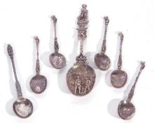 Mixed Lot: five matching Continental tea spoons, each with waisted stems and figural terminals,