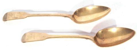 Pair of William IV silver gilt Fiddle pattern table spoons, the front of the handle hand engraved
