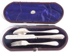 Cased three piece silver christening set, each elaborately chased and engraved with leaves and