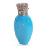 Victorian period blue milk glass scent bottle of flask shape, having hinged unmarked white metal