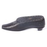 Papier mache and ebonised finish snuff box formed as a shoe, 9cm long