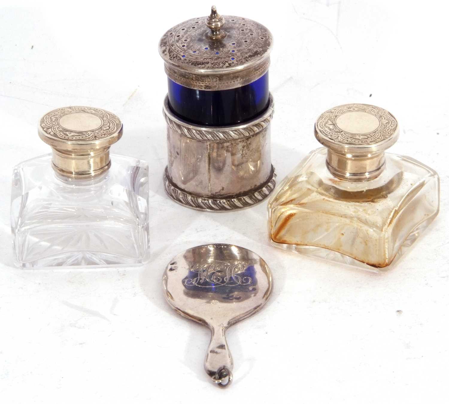 Mixed Lot: Edward VII silver and blue glass pepper, Chester 1912, a small silver backed mirror,