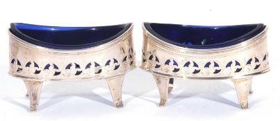 Pair of George III silver salts of oval boat form, the sides partly pierced and engraved, raised