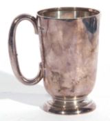 Hallmarked silver tankard of slight tapering form, C-scroll handle to a spreading circular foot,