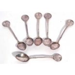 Of golfing interest – a set of six Elizabeth II coffee spoons with decorative stems and golfing