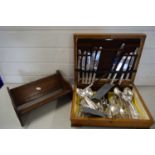 CANTEEN OF SILVER PLATED CUTLERY TOGETHER WITH A SLIDING OAK BOOK RACK