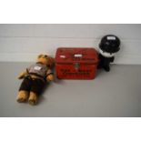 METAL GAS MASK CONTAINER, A HOMEPRIDE FLOUR FIGURE AND A VINTAGE TEDDY BEAR