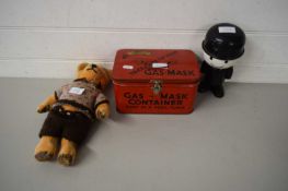 METAL GAS MASK CONTAINER, A HOMEPRIDE FLOUR FIGURE AND A VINTAGE TEDDY BEAR