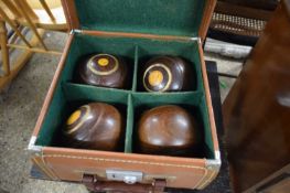 CASE OF WOODEN LAWN BOWLS