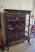EARLY 20TH CENTURY MAHOGANY DISPLAY CABINET WITH TWO GLAZED DOORS AND CABRIOL LEGS