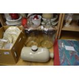 TWO GLASS DEMI-JOHNS AND A STONEWARE HOT WATER BOTTLE (3)