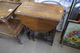 SMALL OAK TABLE ON BARLEY TWIST LEGS